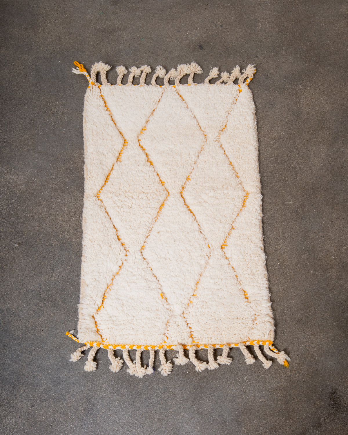 Modern, designer, handcrafted Berber rug from Morocco. Beniourain carpet with beautiful colours and patterns and fluffy wool texture.
